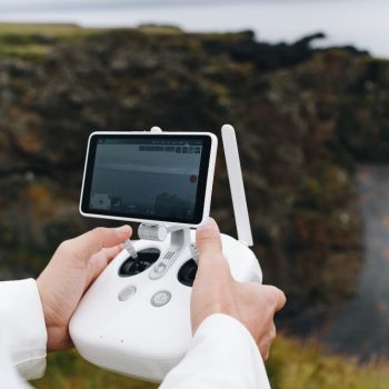man-hold-drone-remote-control-iceland