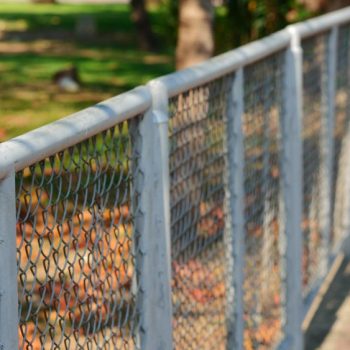 choosing the right chain link fence height factors to consider for your property