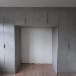 Overbed Wardrobe Storage in Light Grey Textured Finish in Stanmore
