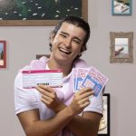 front-view-man-holding-lottery-tickets-min (1)