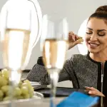 rsz_1a_woman_is_having_grapes_and_wine_in_a_private_jet_aircraft