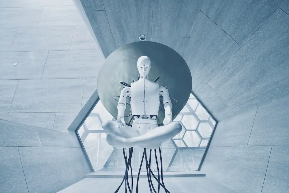 A robot sitting in an empty room