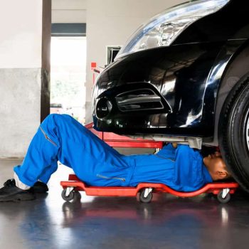 Mechanic-working-on-car-in-garage-dec12