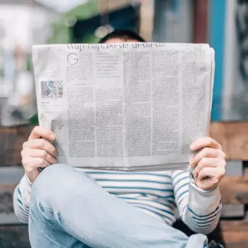 person-reading-a-newspaper