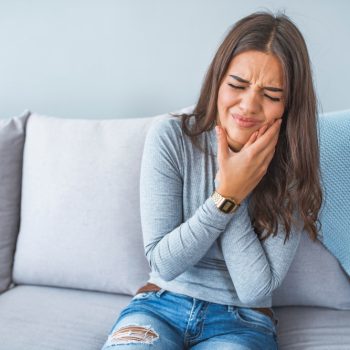 portrait-young-woman-pain-with-toothache (1)