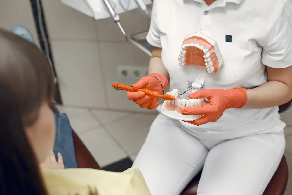 woman-dental-chair-dentist-teaches-proper-care-beauty-treats-her-teeth