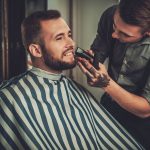 man-getting-his-moustache-trimmed