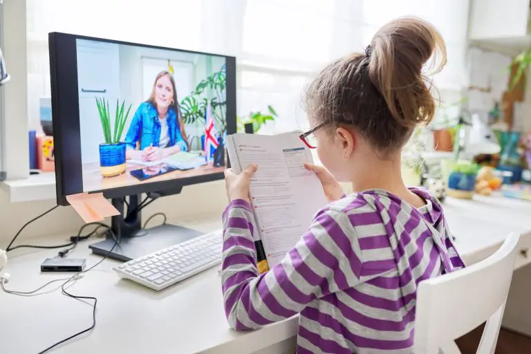 online-learning-little-student-girl-learning-language-remotely-with-an-english-teacher-768x512