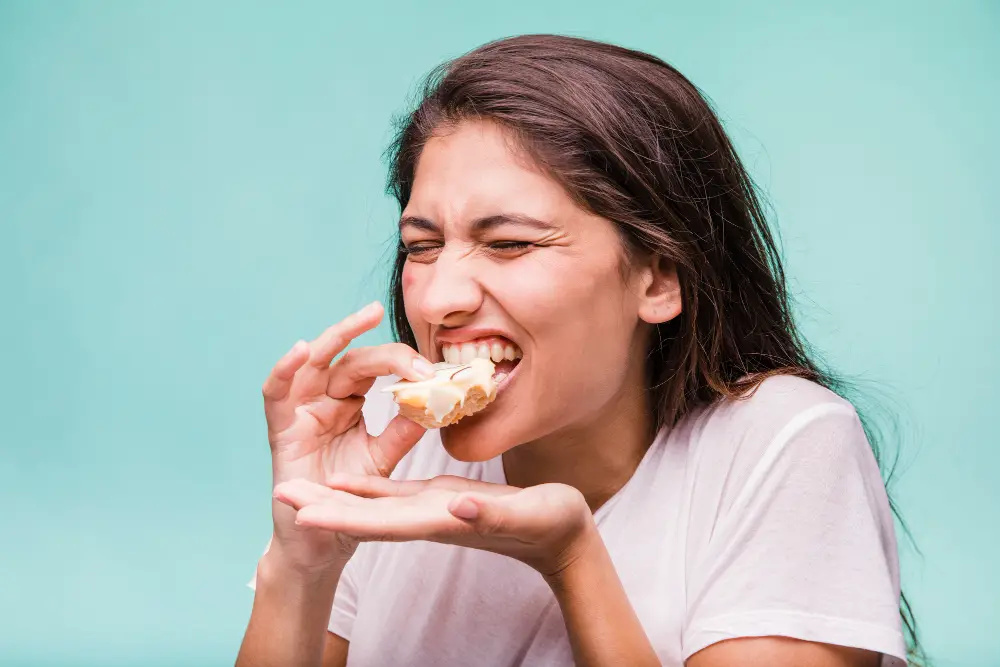 brunette-girl-eating-pastry