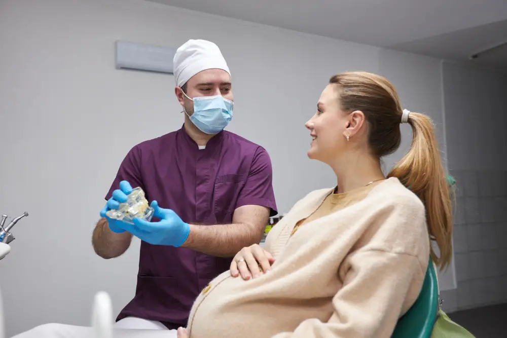 dentist-explains-pregnant-woman-treatment-that-needs-using-sample-human-jaw-bone