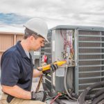 hvac-tech-working-on-a-condensing-unit