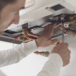 professional installer upgrading boiler