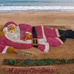 santa-claus-sculpture-created-with-sand--onions-on-puri-beach-2023-12-25