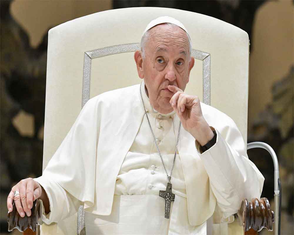 pope-francis-baptizes-babies-one-by-one-in-an-annual-ceremony-at-the-sistine-chapel-2024-01-07