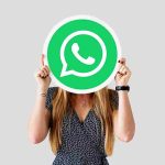woman-showing-whatsapp-messenger-icon_11zon
