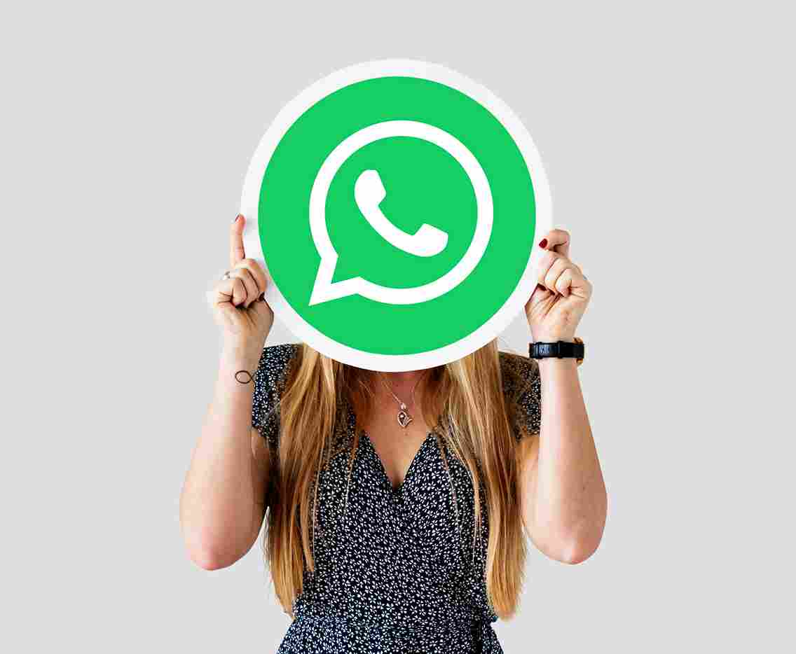 woman-showing-whatsapp-messenger-icon_11zon