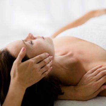 cropped-masseur-giving-massage-woman