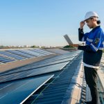 specialist-technician-professional-engineer-with-laptop-tablet-maintenance-checking-installing-solar-roof-panel-factory-rooftop-sunlight-engineers-holding-tablet-check-solar-roof