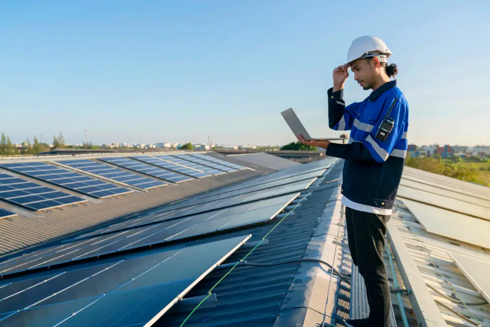 specialist-technician-professional-engineer-with-laptop-tablet-maintenance-checking-installing-solar-roof-panel-factory-rooftop-sunlight-engineers-holding-tablet-check-solar-roof