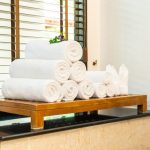 white-towel-table-bathroom-take-bath-shower_74190-13282