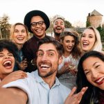 friends-making-a-selfie-together-at-party-picture-id903724814-2