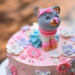 festive-pink-cake-with-cat-top_220770-1171
