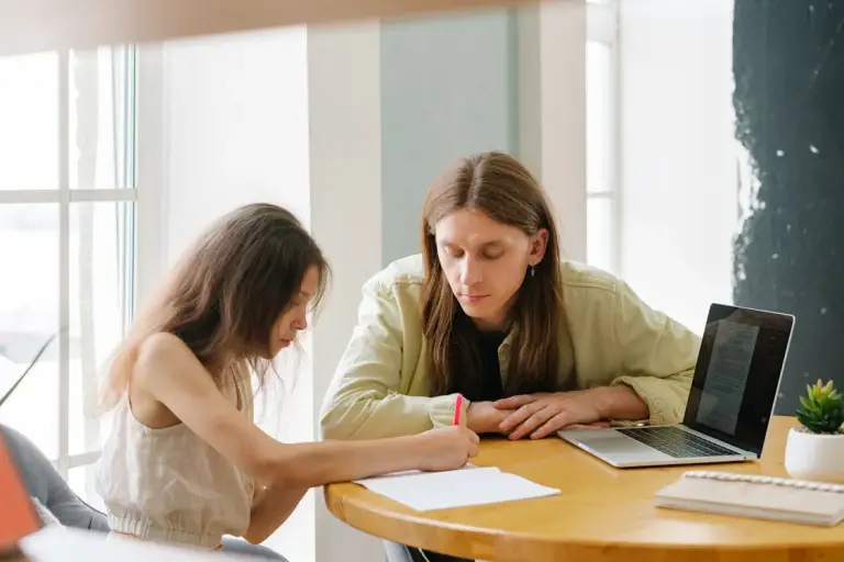 A home tutor teaching a child