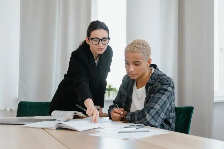 A home tutor teaching a young student