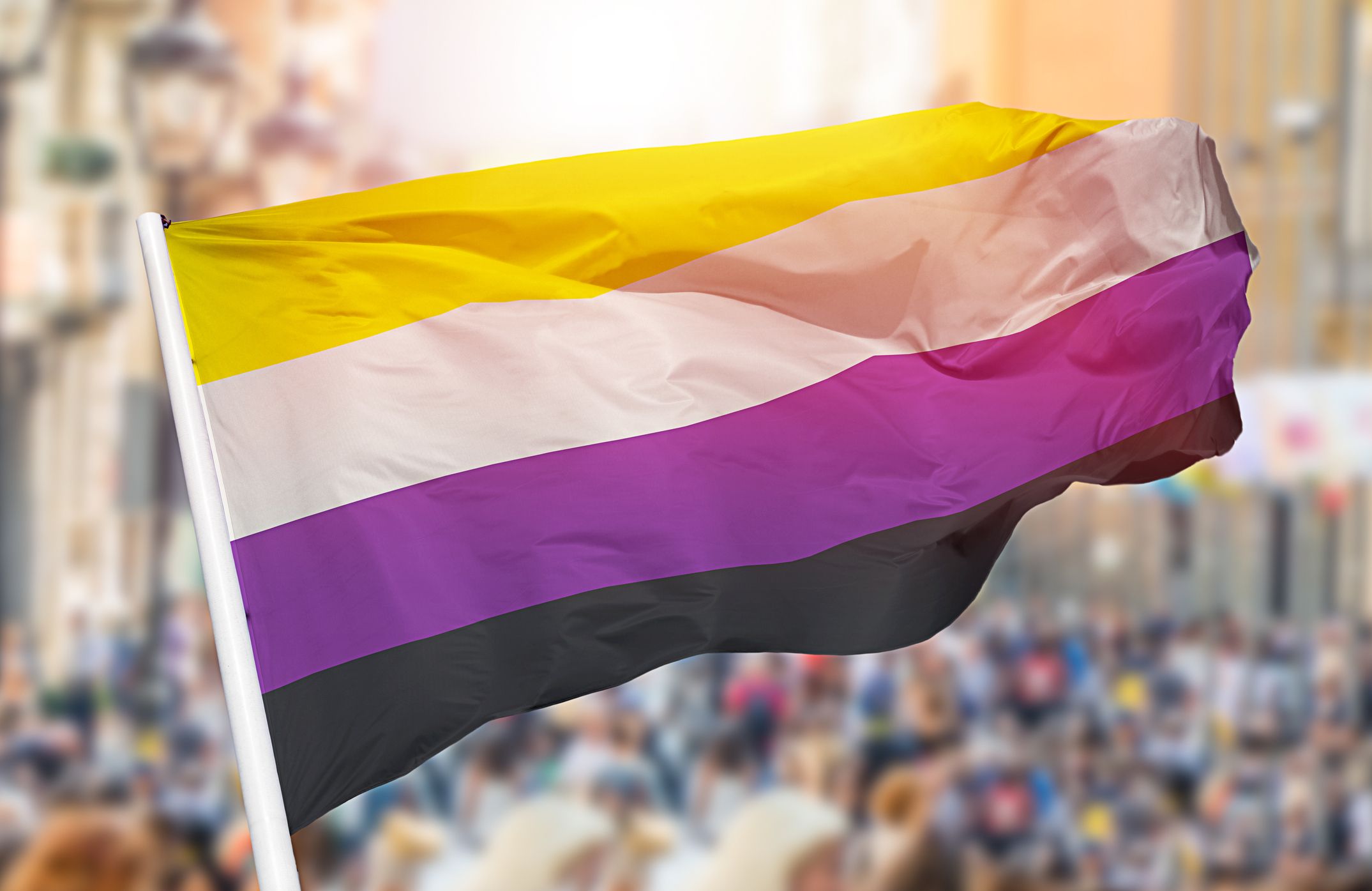 non-binary-pride-flag-blowing-royalty-free-image-1660847409