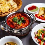 side-lamb-ragout-with-fried-onion-carrot-tomato-sauce-greens-vegetable-salad-table (1)