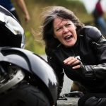 woman-crash-with-motorbike_220770-16322