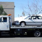 615558251cd430c37e4865b3_white flatbed tow truck