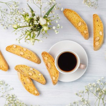 italian-tuscan-traditional-cookies-cantuccini-with-almonds-cup-coffee-light_114579-7661