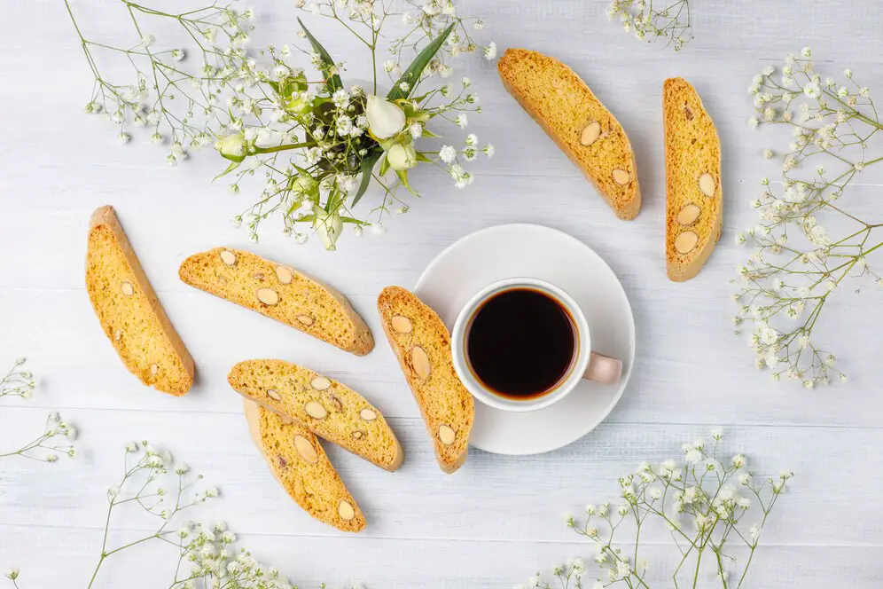 italian-tuscan-traditional-cookies-cantuccini-with-almonds-cup-coffee-light_114579-7661