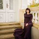 adult-brunette-woman-violet-gown-background-old-vintage-house-with-stairs_627829-8782