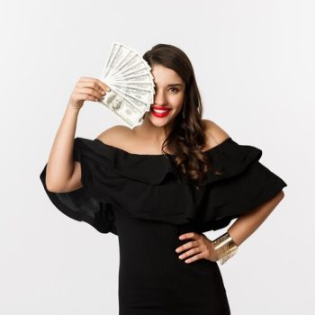 beauty-shopping-concept-fashionable-woman-with-red-lips-showing-dollars-smiling-standing-white-background-with-money_1258-41300