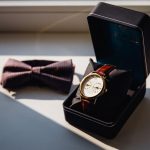 watch-black-box-bow-tie-lie-white-windowsill_8353-687